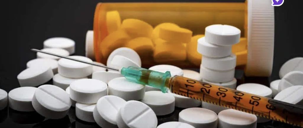 Prescription pills and syringe illustrating the myth of addictive personality traits and substance abuse risks