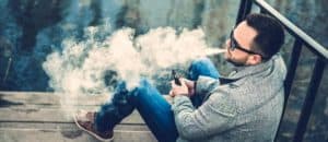 man vaping outside
