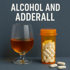 Glass of alcohol beside Adderall pills highlighting the dangers of mixing Adderall and alcohol