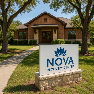 Exterior view of Nova Recovery Center, an alcohol rehab facility in Austin, TX, surrounded by trees and natural landscape.