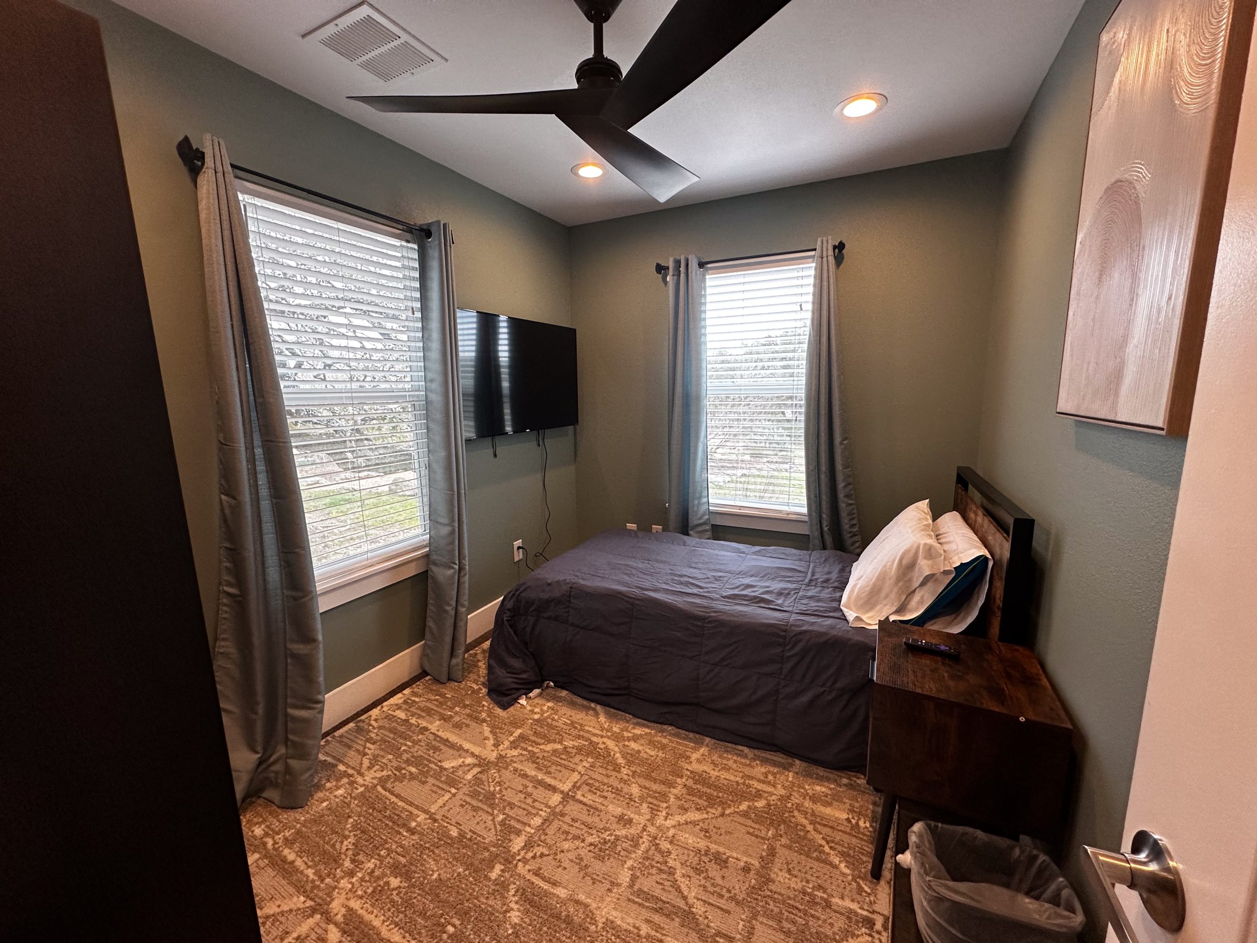 Private bedroom with twin bed and smart TV at Nova Recovery Center’s residential program.