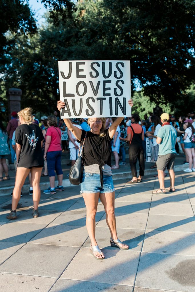 people walking on pedestrian lane during daytime -- Photo by Jesus Loves Austin on Unsplash