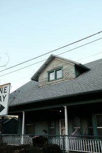 a one way sign in front of a house -- Photo by Julia Rodriguez on Unsplash